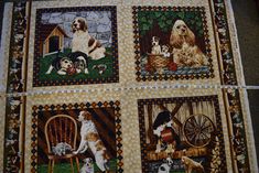 four quilts with dogs on them are shown