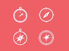 four compass icons on a red background