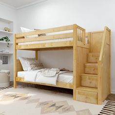 there is a bunk bed with stairs in the room