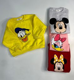 Lined with fleece for extra warmth and comfort. Runs true to size. Size up if in-between sizes or for an oversized fit. Disney Items are Final Sale. Disney Character Print Sweatshirt For Winter, Disney Style Sweatshirt With Character Print For Winter, Cute Mickey Mouse Cotton Sweatshirt, Disney Character Print Winter Sweatshirt, Disney Long Sleeve Sweatshirt With Character Print, Disney Character Print Long Sleeve Sweatshirt, Cute Minnie Mouse Crew Neck Sweatshirt, Cute Mickey Mouse Tops For Fall, Playful Sweatshirt With Cartoon Print For Playwear