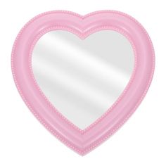 a pink heart shaped mirror on a white background