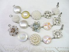 These gorgeous bracelets are fashioned from 'repurposed' vintage earrings. The earrings range from crystal clear rhinestones, faux pearls, ivory, crystals, Aurora Borealis - gold accents, silver accents -- all on silver tone and gold tone . Great bracelet for that special occasion, bride or bridesmaid. Wedding APPEAL! AMAZING sparkle for the BRIDE or bridesmaid! They sit on a bracelet that is aprox. 7.25 inches long and is matte silver tone - nickel free and oxidized. I use only top quality adhe Vintage Adjustable Jewelry For Wedding, Vintage Adjustable Wedding Jewelry, Adjustable Vintage Wedding Jewelry, Elegant Wedding Bracelets With Vintage Charm, Elegant Vintage Charm Bracelets For Jewelry Making, Vintage Pearl White Wedding Jewelry, Adjustable Silver Jewelry For Vintage Events, White Costume Jewelry Bracelets For Jewelry Making, Adjustable Vintage Charm Jewelry For Wedding