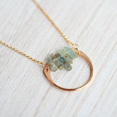 This necklace combines the beauty of abstract design with the ease and simplicity of a minimalist piece. A gorgeous row of gorgeous raw Aquamarine sticks in various lengths are set into 14k Gold Filled chain and accented with a 14k Gold Filled semi-circle creating a modern pendant that's easy to reach for daily.  The texture and soft hue of these beautiful, natural Aquamarine gemstones give this bohemian necklace an ethereal feel.   Shown in 14k Gold Fill but also available in 14k Rose Gold Fill Rose Bar, Bar Graph, Moon Phases Necklace, Bar Graphs, Natural Stone Jewelry, March Birthstone, Bohemian Necklace, Jewelry Sterling Silver, Small Rings