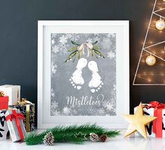 a christmas card with the word mistlet on it next to presents and a tree