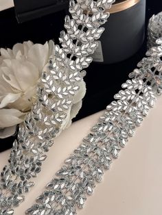 4cm Mirror Metallic Silver Cutwork Vine Border Trim - Elegant Embellishment Enhance your projects with our 4cm Mirror Metallic Silver Cutwork Vine Border Trim! This exquisite lace trim is perfect for adding a touch of sophistication to chokers, saris, and waistbands, making it an essential for any DIY enthusiast. Materials: High-quality polyester lace Reflective metallic silver finish Durable and lightweight Features: Intricate vine cutwork design for a chic look Shimmering mirror accents that c Vine Border, Embroidery Online, Buy Mirror, Embroidery Saree, Silver Lace, Indian Embroidery, Silver Mirror, Lace Border, Fabric Trim