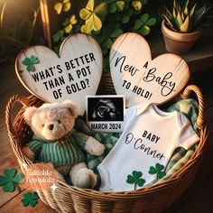 a teddy bear sitting in a basket filled with baby clothes and other items that say, what's better than a pot of gold