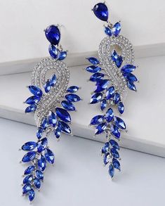 Blue Rhinestone Fabulous Drop Earrings Stainless Steel Drop 3.9" Material:Zinc Alloy Color:Blue Earring Studs Materials:Stainless Steel Blue Crystal Chandelier Earrings For Party, Glamorous Blue Chandelier Earrings For Party, Blue Jeweled Crystal Earrings For Party, Blue Crystal Earrings With Sparkling Stones For Party, Sapphire Crystal Earrings For Party, Glamorous Blue Crystal Earrings For Party, Sapphire Dangle Crystal Earrings For Party, Sapphire Crystal Dangle Earrings For Party, Blue Stud Earrings