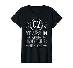 a black t - shirt with the words'00 years in and i haven't killed him yet