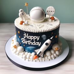 a birthday cake with an outer space theme