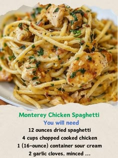 a plate of pasta with chicken and herbs on it, in front of a recipe card