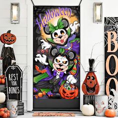 a door decorated for halloween with mickey mouse and friends