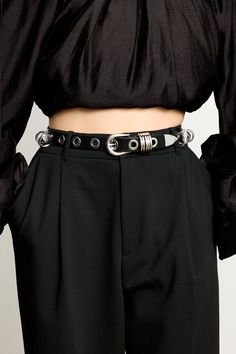 Based on the best-selling Hollyhock, the Revenge belt emerges to be a luxurious core belt in the Déhanche repertoire. Its grommets and rings pay homage to the rebellious spirit of punk fashion and S&M subculture, resulting in an accessory that captivates with its audacious charm. Handcrafted in Italy, the belt features smooth black leather, grommets and ring charms that are placed individually by hand. The Revenge, Punk Fashion, Revenge, Best Sellers, Black Silver, In Italy, Black Leather, Charms, Italy