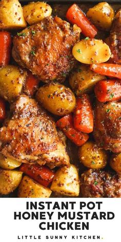 chicken and potatoes with carrots in a skillet, closeup view from above