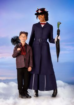 two children dressed in costumes standing next to each other with an umbrella and bird on their head