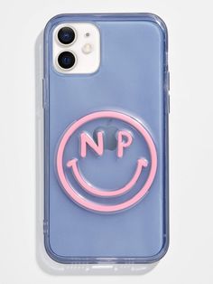 an iphone case with a smiley face in the middle and a pink circle around it