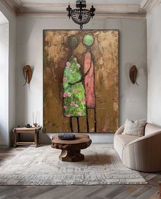 a living room with a large painting on the wall