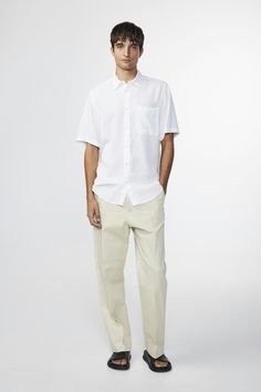 Linen Short Sleeve Tops For Daywear, Short Sleeve Linen Tops For Daywear, Classic Shirt With Rolled Sleeves For Casual Gatherings, Casual Linen Shirt With Shirttail Hem, Summer Cotton Shirt With Straight Hem, Linen Workwear Tops With Welt Pockets, Relaxed Fit Shirt With Rolled Sleeves, Casual Linen Shirt For Daywear, Modern Linen Blouse With Relaxed Fit