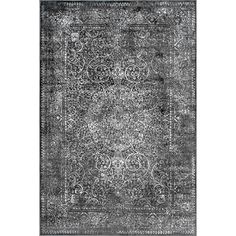 a black and white rug with an intricate design