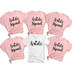 six shirts that say bride and bridal on the front, one is pink with black lettering