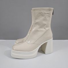 Free People Double Stack Chunky Platform Boot Shoe Bone Ivory Patent Leather Nwot * Size: Eu Size 39.5 (Us Size 9) * Color: Bone (Ivory) * Shiny Patent Leather Uppers * Synthetic Lining * Squared Toe * Back Zipper Closure * Double Stacked Platform * High Block Heel * Rubber Outsoles * 1.5" Chunky Platform * 4" Block Heel * 7" Shaft Condition: New Without Tags (These Were Store Displays And May Show Light Wear From Being Tried On And Handled Or From Label Removal. Please See All Attached Photos A Croc Heels, Tan Suede Boots, Free People Boots, Chunky Heeled Boots, Platform Boots Chunky, Boot Shoe, Color Bone, Studded Shoes, Western Ankle Boots