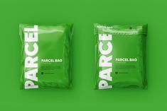 two bags of parcel on a green background