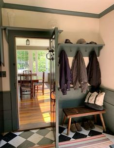 the entryway is clean and ready to be used as a mudroom or sitting area