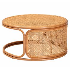 a rattan coffee table with an oval wooden frame and wicker design on the top