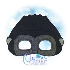 a black mask with two eyes and a nose