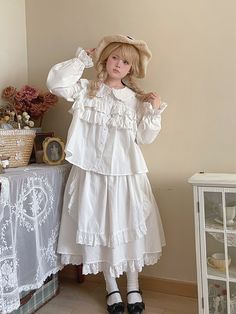 This top is made from 100% pure cotton, offering a loose, shirt-like fit that suits everyone comfortably. The delicate heart-shaped buttons add a touch of sweetness and charm. Multiple layers of ruffled trim provide a sense of depth and texture to the design.  Price includes only one top.   	 		 			Size 			Free Size 		 		 			Shoulders 			38 		 		 			Bust 			112 		 		 			Sleeve Length 			61 		 		 			Length 			53 Kawaii Leg Warmers, Kawaii Pajamas, Punk Tops, Kawaii Hat, Punk Skirt, Pastel Punk, Kawaii Hoodies, Pan Collar Dress, Fashion Corset