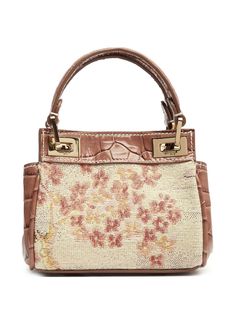 Find GIAMBATTISTA VALLI Patterned Jacquard Shoulder Bag on Editorialist. This Giambattista Valli shoulder bag is crafted from patterned jacquard with a twist-lock closure. It features a main compartment, an adjustable shoulder strap, and a top handle. Luxury Tapestry Bags For Formal Occasions, Beige Top Handle Tapestry Shoulder Bag, Beige Tapestry Top Handle Shoulder Bag, Jacquard Bags, Formal Tapestry Bags, Luxury Embroidered Cream Bag, Luxury Rectangular Tapestry Shoulder Bag, Elegant Floral Print Shoulder Bag, Elegant Multicolor Floral Print Shoulder Bag