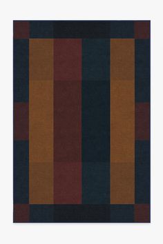 an area rug with different colored squares on it