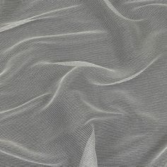 an image of a white fabric with wavy lines