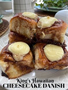 four pieces of cheesecake on a plate with the words king's hawaiian cheesecake danish