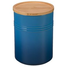 a blue plastic container with a wooden lid