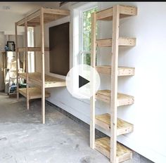 a room that has some shelves in it