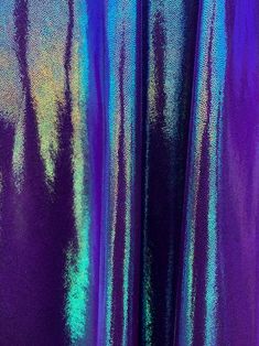 purple and blue fabric with metallic foil on it