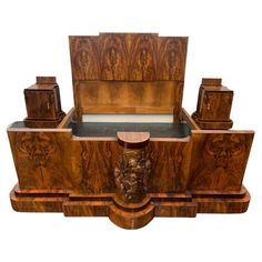 an elaborately carved wooden chest with drawers