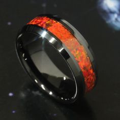 This beautiful Comfort Fit Men Women Tungsten Ring, 8mm Black IP Ring, Synthetic Red Fire Opal Inlay Beveled Edge Tungsten Ring, Custom Engraved Personalized Ring by DoubleAccent is meticulously crafted in gleaming and durable Tungsten. Available Sizes: 7 to 15Available  Our client's satisfaction means the world to us; we offer customization options such as engraving, to assure that our rings accommodate your taste.  * We use a top-of-the-line laser and scratch art to custom engrave the rings to your specification. * In the picture above, we have provided you a list of basic fonts and symbols for the engraving. In cases where the font is not specified on the order, our default font is Lucida Script. * Engravings done on a 2mm band are very small. For legible engravings, we would recommend Plain Rings, Scratch Art, Light Ring, Mens Silver Necklace, Personalized Ring, Tungsten Wedding Bands, Wolfram, Fit Men, Tungsten Ring