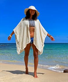 "Beach Cover Up, Summer White Cover Up, Cotton Cover Up Super soft 100% Natural cotton (2 layers weave, unbleached, undyed) with subtle texture. Medium-thick, soft, flowy and so comfy! Made in one size to fit S to XXL / US:4/6/8/10/12/14/16 Measurement; Width end to end 40\" Length 28\" **Model is a size US 6. 33\" bust and 36\" hip.\" Description: Made into a one size fits all cover up kimono cardigan that is so versatile. It has a wood button closure on both sides and in the front. You can be White Cotton Cover-up For Warm Weather, White Cover-up For Beach Season, Cream Summer Cover-up For Vacation, Summer Cream Cover-up For Vacation, Cream Beachwear Cover-up For Beach, Cream Cover-up For Beach Season, Layers Weave, Summer Cover Ups, Beach Jacket