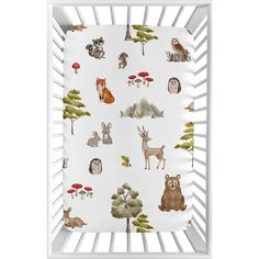 an animal themed crib sheet with trees, animals and mushrooms on the white background