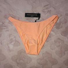 - Brand New With Tags, With Hygienic Liner, Never Worn - Authentic From Triangl - Size Xl Cheeky Bottoms But Runs Small - Peche Terry Material Peach Beachwear Swimwear For Spring, Summer Beach Peach Bottoms, Peach Fitted Swimwear For Poolside, Peach Triangle Top Swimwear For Beach, Orange Seamless Bottoms For Summer, Orange Seamless Summer Bottoms, Peach Stretch Swimwear For Spring, Pink Seamless Bottoms For Sunbathing, Peach Swimwear For Summer Swimming