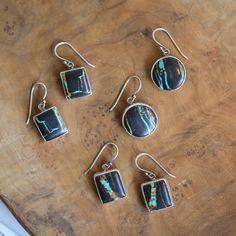 There are four, gorgeous pairs of BlackJack Turquoise drop earrings in this listing. You choose ONE pair from the drop-down - your pair will be highlighted in the photo as you choose. We will send the exact one-of-a-kind pair of Black Jack Turquoise drop earrings in the photo. This is uniquely stunning, blackjack turquoise. A super interesting blackish/brown boulder with blue to green turquoise appearing in ribbons - like an abstract painter's lines. Breathtaking. All metal is .925 Sterling Silv Turquoise Highlights, Turquoise Drop Earrings, Lapis Ring, Sacred Stones, Black Jack, Lapis Lazuli Ring, Gold And Silver Rings, Royston Turquoise, Yellow Citrine