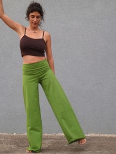 A High-Quality Fitness Wide Legg Hippie Green Yoga Pants, Festival Boho Clothing, Hand Made Out of Amazing Cotton Lycra, Beautiful Loose Pants, Perfect for the up-and-coming season. These beautiful and relaxed boho pants are the perfect style for your everyday visit to a café, a good yoga session, as well as a quick visit to a festival nearby. A unique and gorgeous loose pants, perfectly tailored to fit and compliment all body types, from size S to size XL. It is loose and comfortable to wear, a Cotton Leggings With Elastic Waistband For Yoga, Cotton Yoga Leggings With Elastic Waistband, Stretch Cotton Sweatpants For Yoga, Yoga Cotton Leggings With Elastic Waistband, Cotton Leggings For Yoga With Relaxed Fit, Casual Full Length Harem Yoga Pants, Casual Green Cotton Leggings, Green Yoga Bottoms, Stretch Yoga Trousers