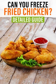 fried chicken on a wooden platter with ketchup and lettuce