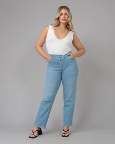 This Baker jean is the perfect addition to your wardrobe! With a high-rise and relaxed fit, it has a stylish crossover button fly and comes in the gorgeous wash Luster. Get ready to rock this trend-setting style! Fall for the boyfriend fit with these plus size jeans—try with a basic tee and blazer for a look that's fierce and flawless LOLA JEANS Women's BAKER-LS High Rise Crossover Jeans | Luster | Jeans | Materials & Care Instructions: ['98% Cotton, 2% Spandex', 'Machine wash cold', 'Imported'] Crossover Jeans, Jeans Material, Plus Size Jeans, Basic Tee, Boyfriend Fit, Premium Denim, High Rise Jeans, Colored Jeans, Stretch Denim