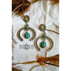 Our Deep Ellum Earrings feature a circle stud, adorned with a silver semi-circle with rope detailing. Cascading gracefully from the semi-circle, a captivating turquoise drop surrounded by silver adds a touch of western elegance and movement. 4" Long 2 1/4" Wide 1" Circle. Swimsuit Jewelry, Circle Studs, Curvy Jeans, Curvy Dress, A Circle, Jewelry Sales, Turquoise, Top Outfits, Silver