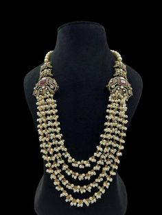 Gorgeous Victorian Style Long Pearl Necklace in Victorian style with matching earrings Highest quality and craftsmanship Free shipping Since natural semiprecious beads are used in this necklace, Color and shape of the beads may vary slightly Please let me know if you have any questions Elegant Heavy Beaded Necklace For Celebrations, Elegant Gold Kundan Beads, Heavy Elegant Kundan Necklace With Round Beads, Elegant Heavy Bridal Necklace With Round Beads, Traditional Gold Beads With Stone Work, Formal Temple Jewelry Bridal Necklace With Beads, Formal Beaded Temple Bridal Necklace, Rani Haar, Pearl Mala