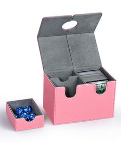 a pink box with two dice in it