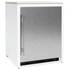 a silver refrigerator freezer sitting on top of a white floor next to a wall