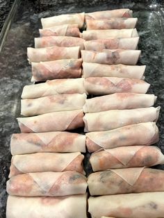 some food is laying out on the counter and ready to be cooked in the oven